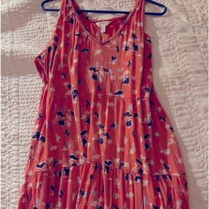 Lightweight orange sleeveless summer dress.